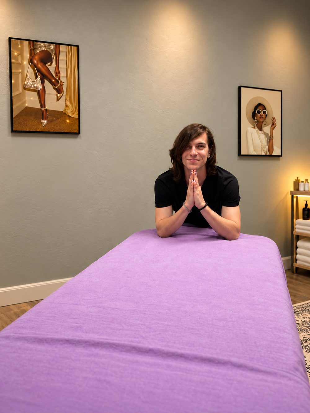Portrait of Denis Zdorovets leaning on his massage table